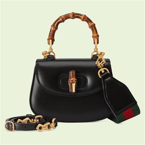 borsa gucci con manico in bamboo|La nuova borsa Gucci Bamboo 1947 di Alessandro Michele.